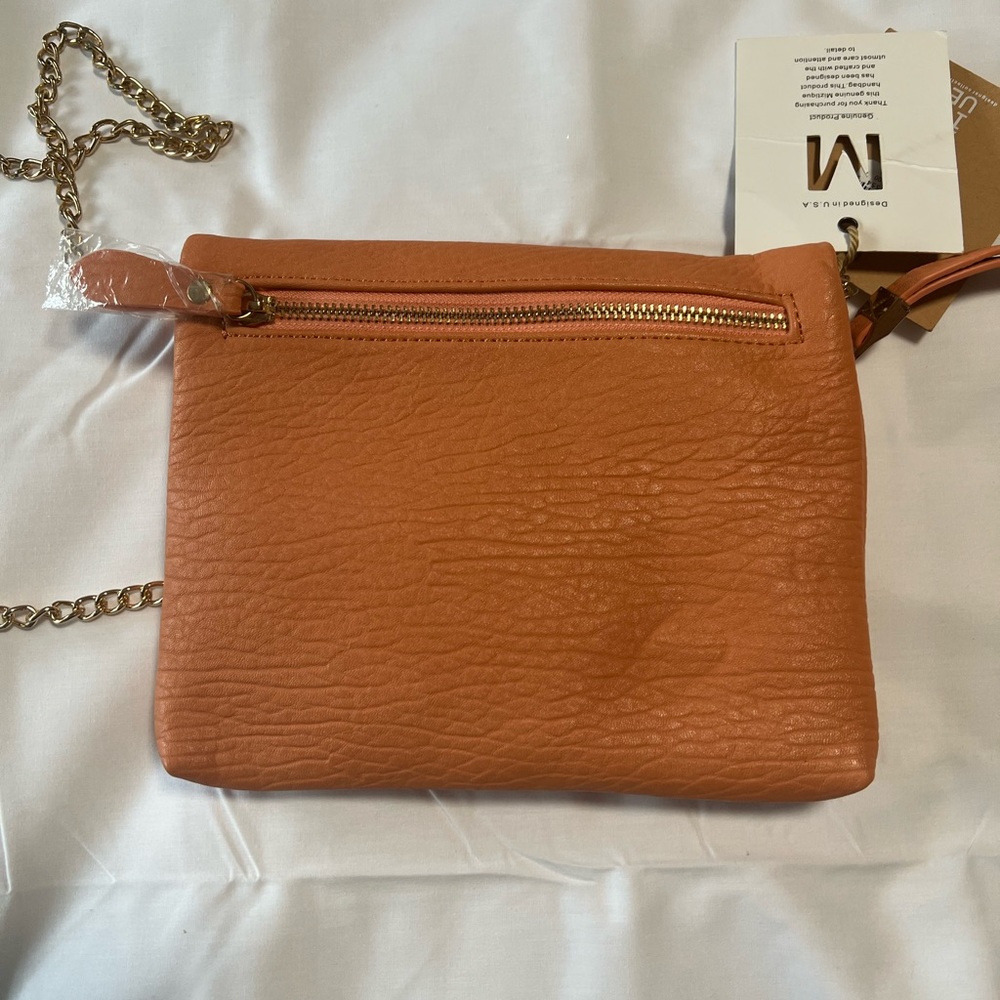Mizitique crossbody bag with gold crossbody strap. NWT